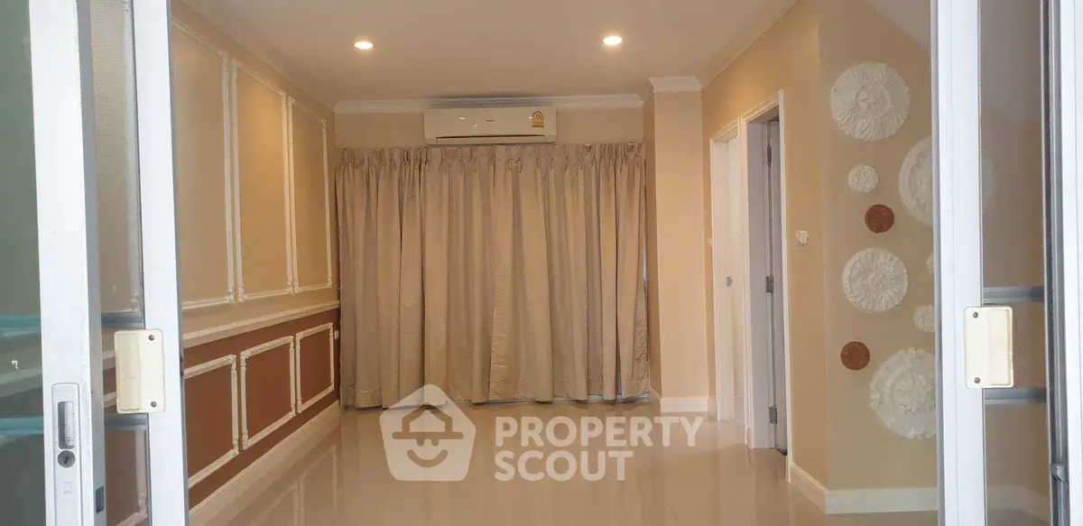 Spacious interior with elegant decor and air conditioning, ideal for modern living.