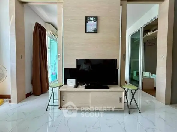 Modern living room with sleek TV setup and stylish decor