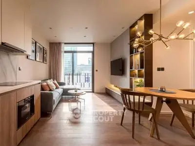 Modern living room with stylish decor and open layout, featuring a cozy sofa and elegant lighting.