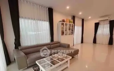 Spacious modern living room with sleek sofa and elegant decor