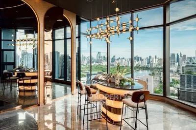 Luxurious penthouse with panoramic city skyline view and modern interior design.