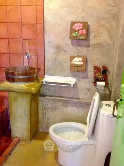 Charming rustic bathroom with unique decor and earthy tones