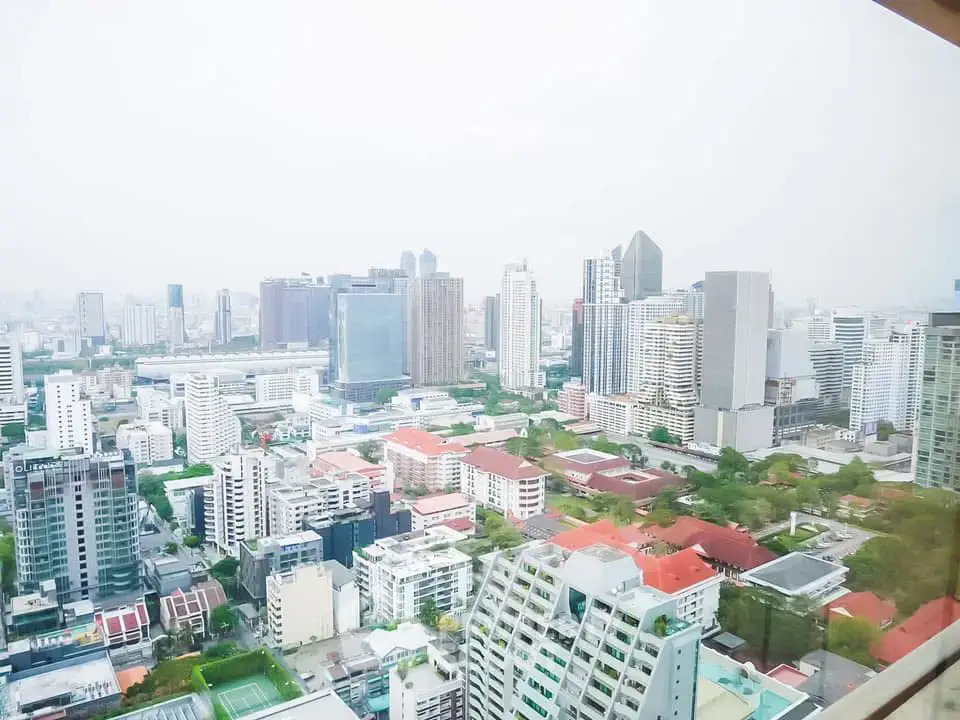 Stunning cityscape view from high-rise building showcasing urban skyline and architecture.