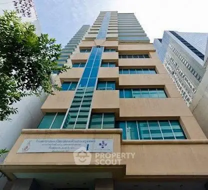 Stunning modern high-rise building with sleek architectural design in prime urban location.