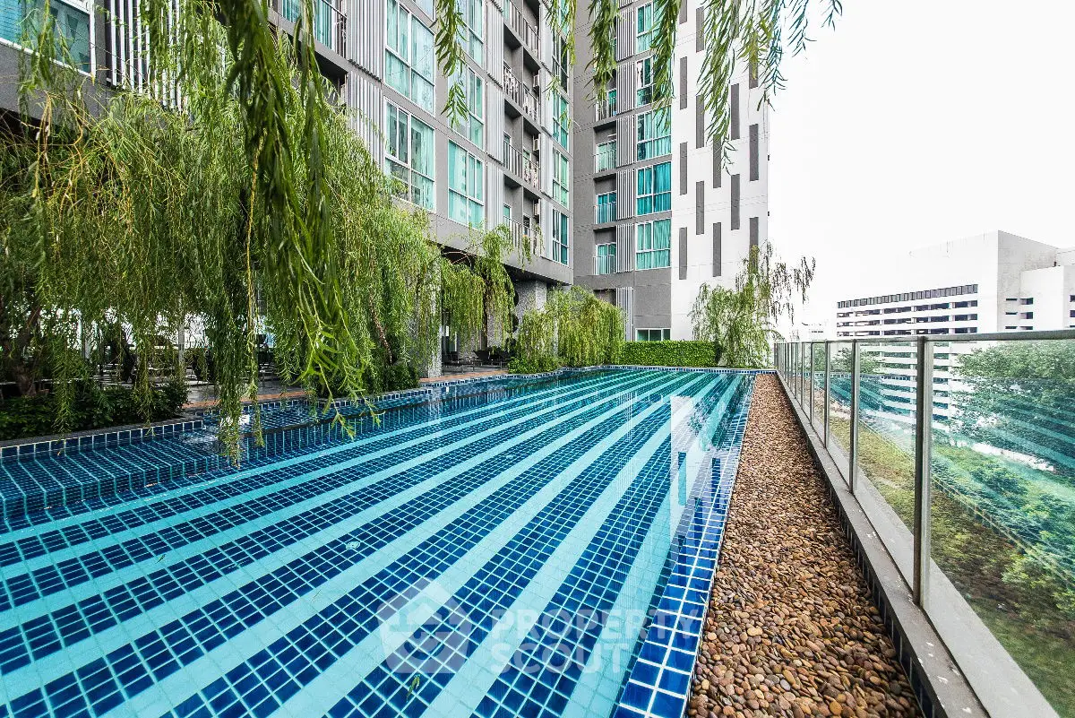 Luxurious modern apartment with stunning rooftop pool and city views.