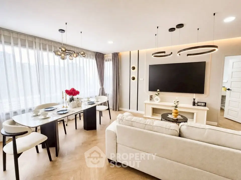 Luxurious modern living room with elegant dining area and stylish decor