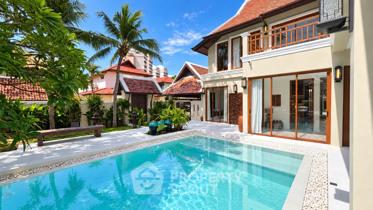 Luxurious tropical villa with private pool and lush garden, perfect for serene living.