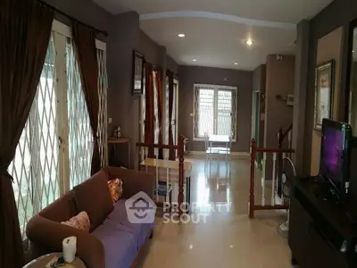Spacious living room with elegant decor and natural light