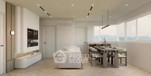 Modern living and dining area with sleek furniture and panoramic windows.