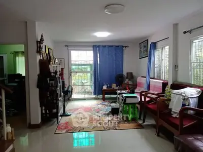 Cozy living room with bright natural light and stylish decor