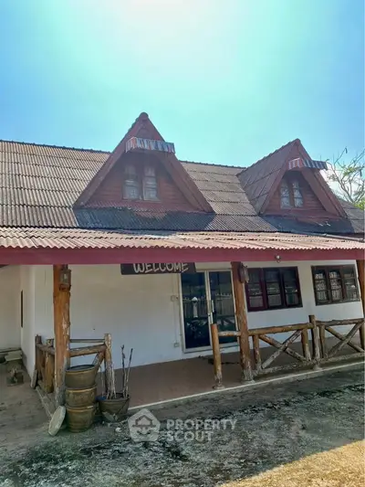 Charming rustic house with wooden accents and welcoming porch