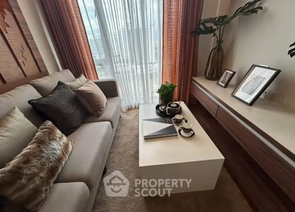 Stylish living room with cozy sofa and modern decor, perfect for relaxation.