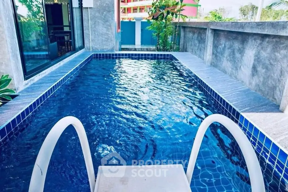 Luxurious private pool with modern design and serene ambiance, perfect for relaxation and leisure.