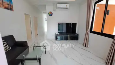 Modern living room with sleek marble flooring and stylish furniture