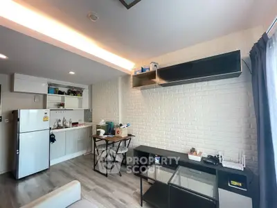 Modern studio apartment with open kitchen and stylish decor