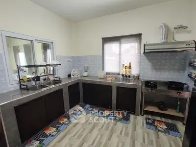 Modern kitchen with sleek countertops and open layout design