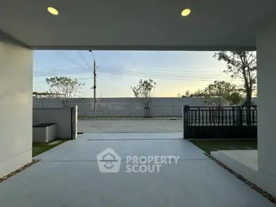 Modern driveway with sleek gate and minimalist landscaping
