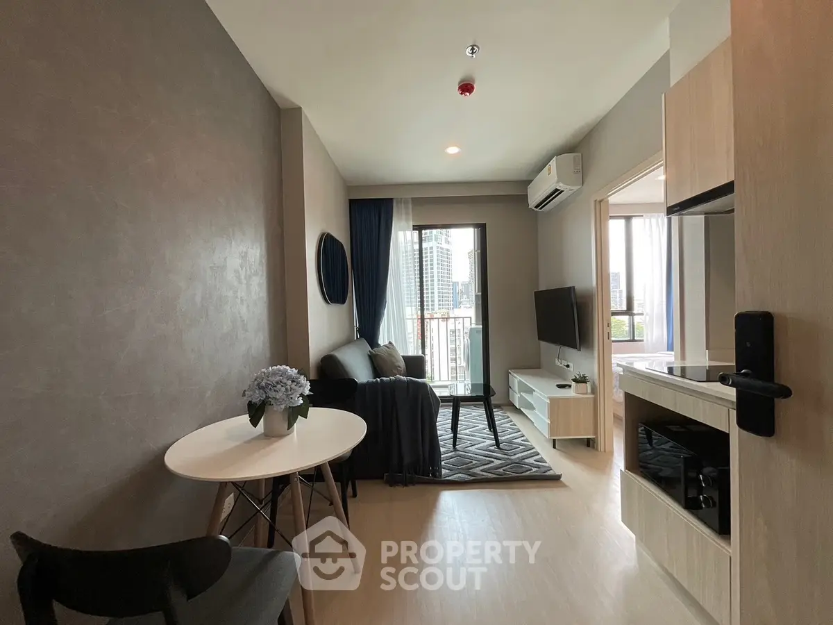 Modern living room with balcony view in stylish apartment