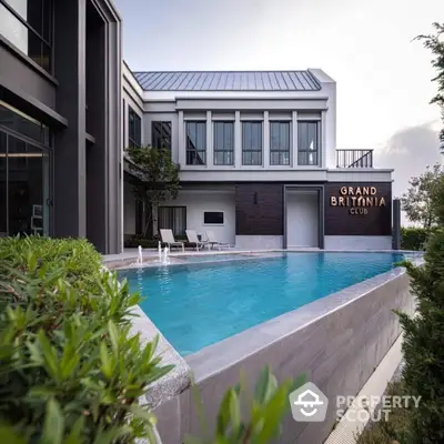 Luxurious modern building with elegant pool at Grand Britannia Club