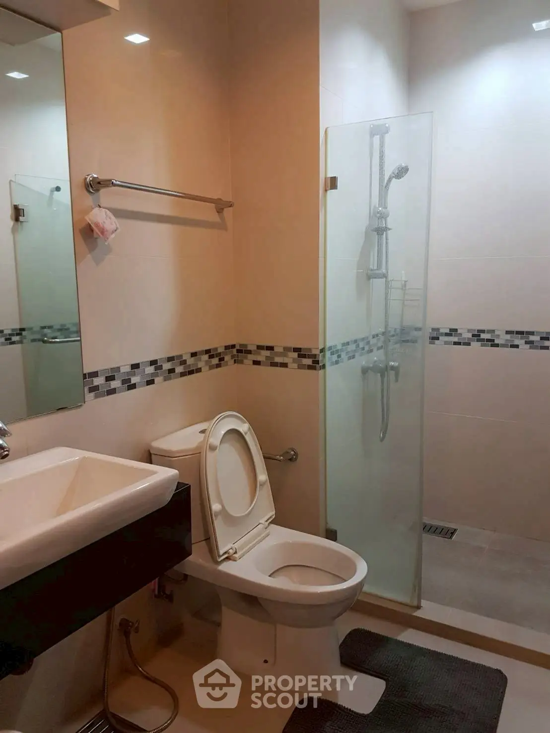 Modern bathroom with shower and sleek design