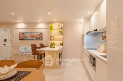 Modern kitchen with open layout and stylish decor, featuring sleek cabinetry and ambient lighting.