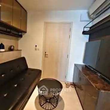 Modern compact living room with sleek furniture and minimalist design