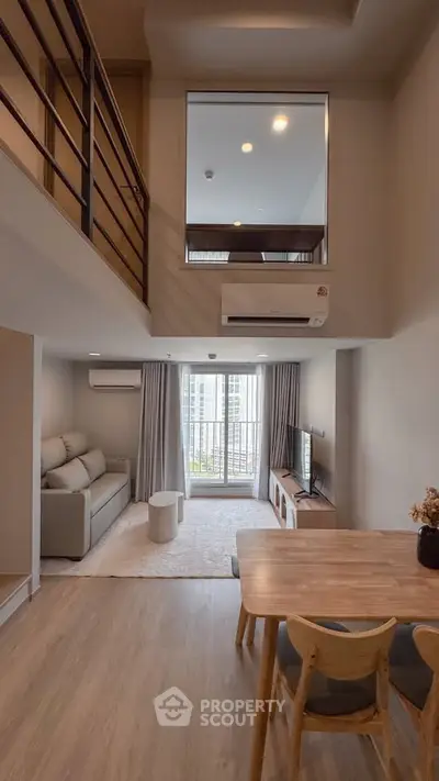Modern loft apartment with spacious living area and stylish decor
