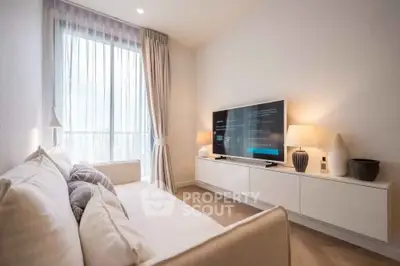 Modern living room with sleek TV setup and elegant decor