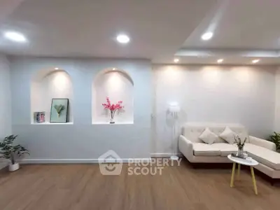 Modern living room with elegant decor and cozy seating area