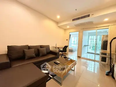 Modern living room with sleek furniture and balcony view in urban apartment