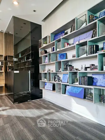 Modern study room with stylish shelving and glass partition