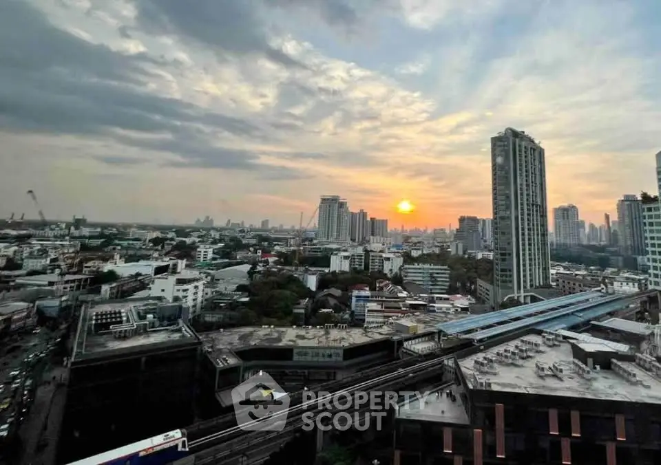Stunning cityscape view at sunset with high-rise buildings and skyline