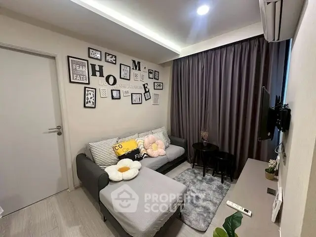 Cozy living room with stylish decor and comfortable seating in modern apartment.