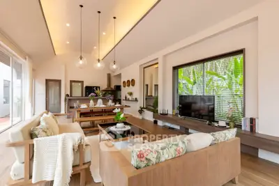 Spacious modern living room with elegant decor and natural light