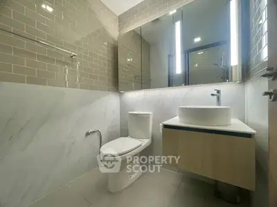 Modern bathroom with sleek fixtures and elegant tile design