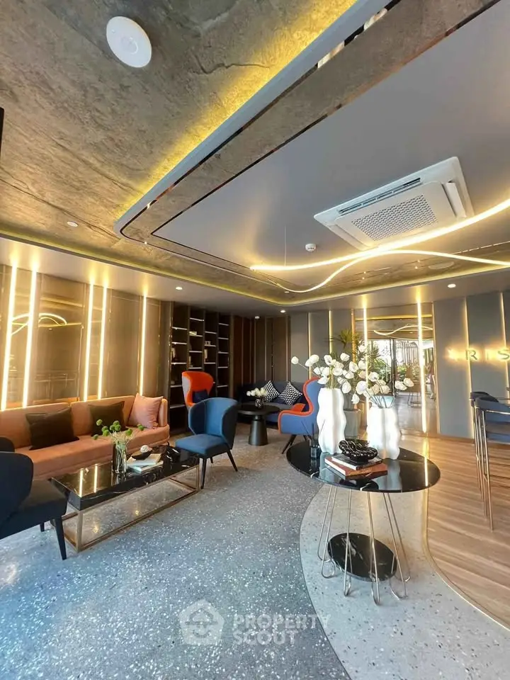Luxurious modern living room with stylish furniture and ambient lighting, perfect for sophisticated urban living.