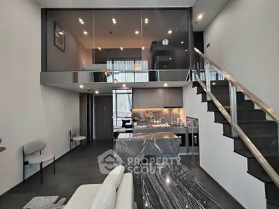 Modern duplex apartment with sleek kitchen and stylish living area