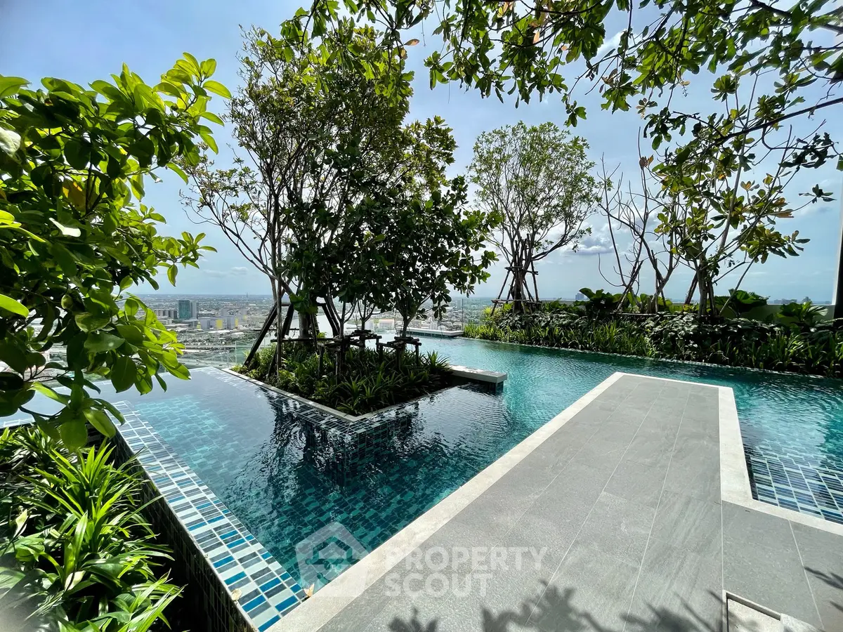 Luxurious rooftop pool with stunning city views and lush greenery