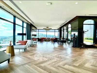 Luxurious open living room with panoramic views and elegant decor