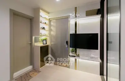 Modern living room with sleek TV setup and stylish decor