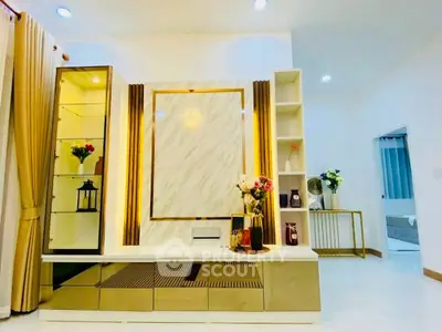 Elegant living room with modern decor and stylish shelving unit