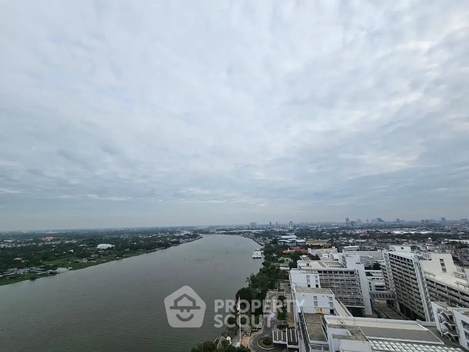 Stunning panoramic cityscape view with river and skyline, perfect for urban living enthusiasts.