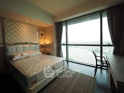 Luxurious bedroom with stunning river view and elegant decor