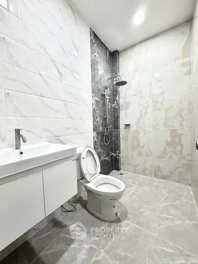 Modern bathroom with sleek tiles and contemporary fixtures