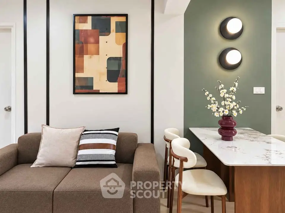 Modern living room with stylish decor and elegant dining area