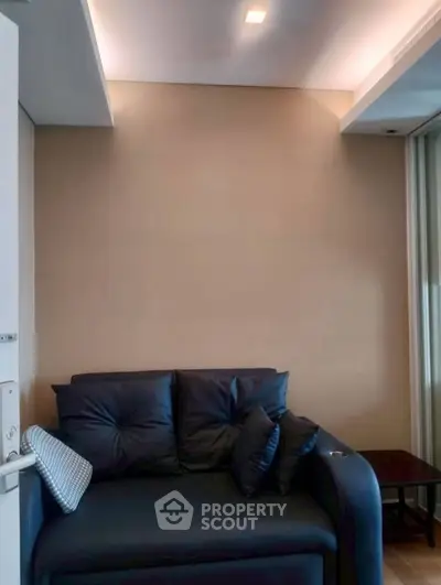 Cozy living room with modern sofa and ambient lighting