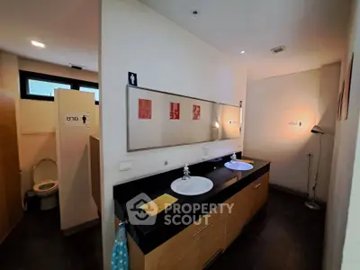 Modern bathroom with dual sinks and sleek design