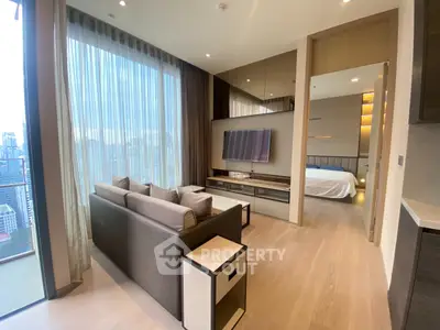 Luxurious modern living room with city view and elegant bedroom