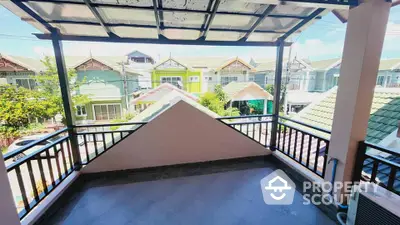 Spacious balcony with a scenic neighborhood view, perfect for relaxation and outdoor enjoyment.