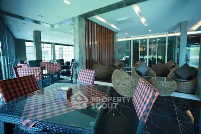 Luxurious modern living room with stylish furniture and elegant decor.